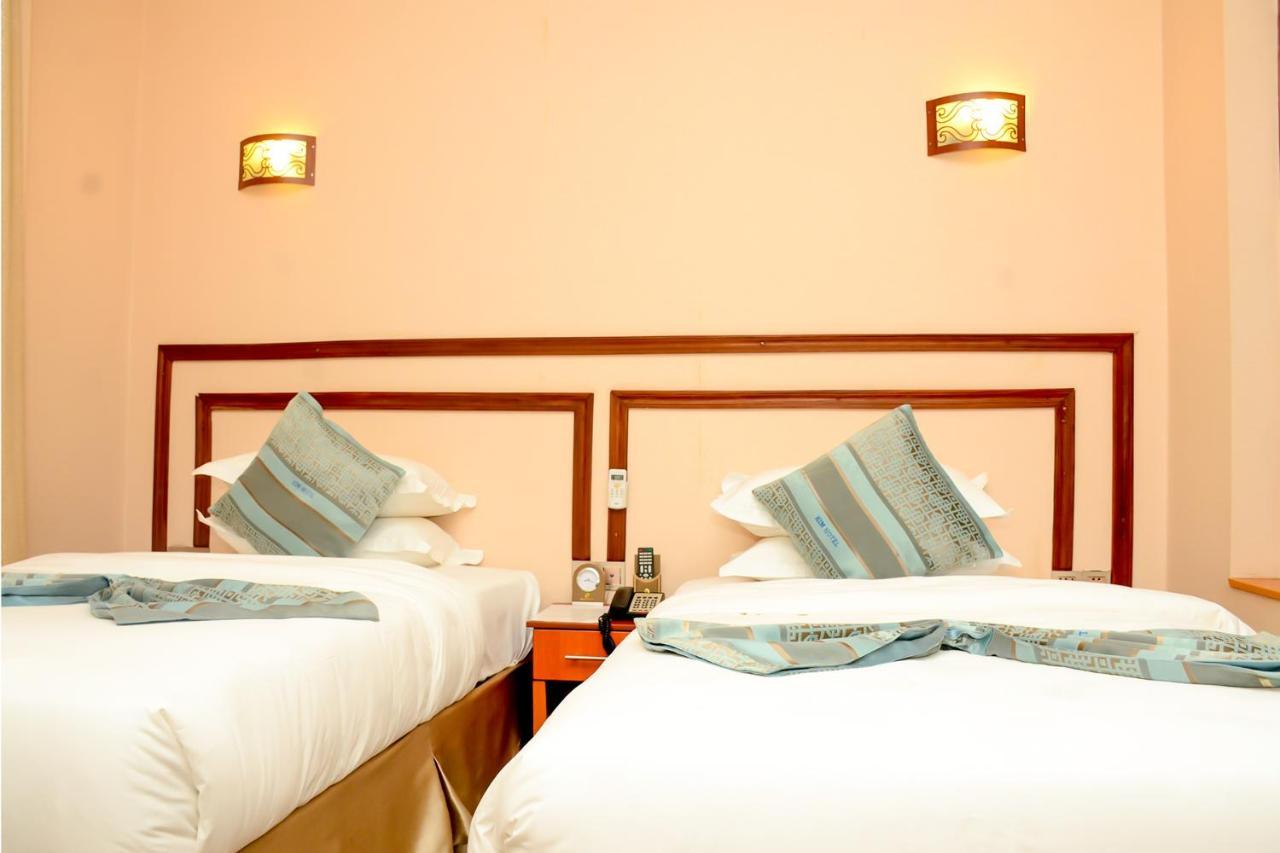 Kim Hotel Кигали Экстерьер фото